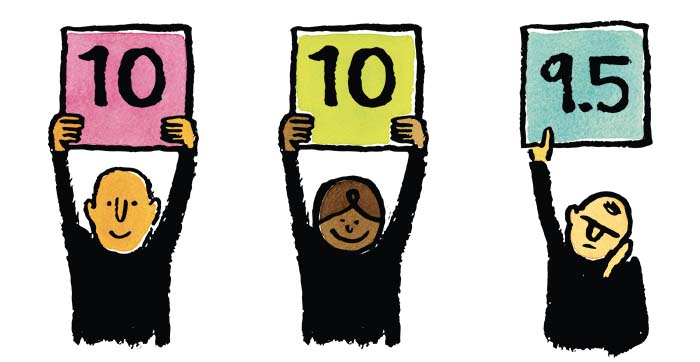 three people holding up scorecards of 10, 10, and 9.5